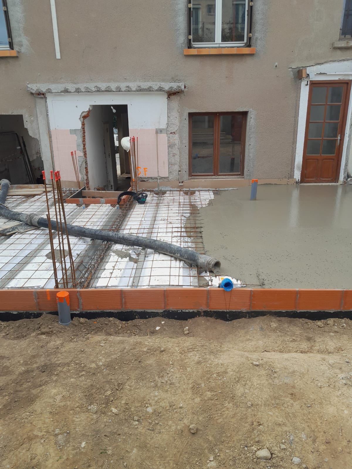 Extension d'une maison en milieu contraint dans une cour intérieure à Perpignan